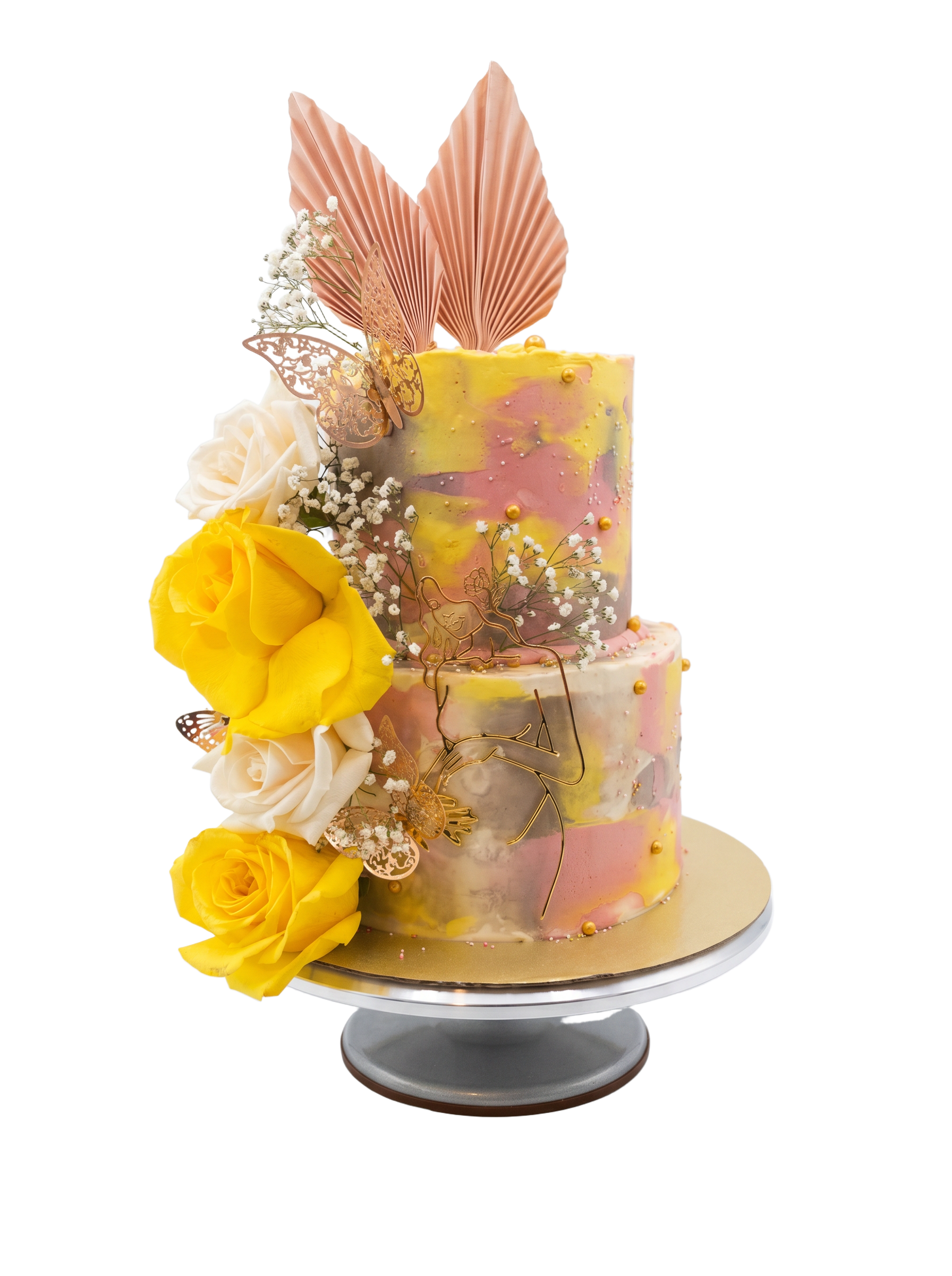 Two-tier watercolor buttercream cake with yellow roses and rose-gold accents