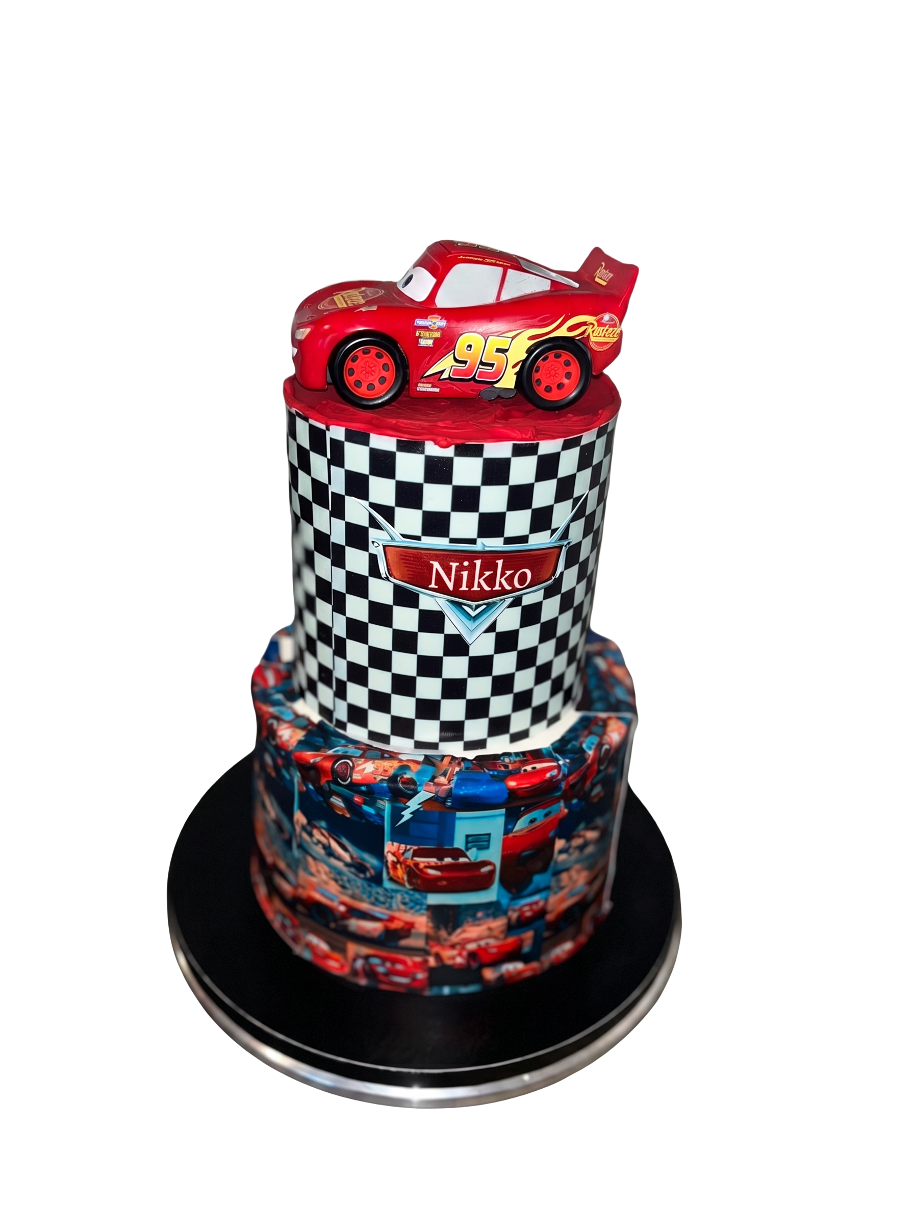 Two-tier Cars-themed birthday cake with Lightning McQueen topper